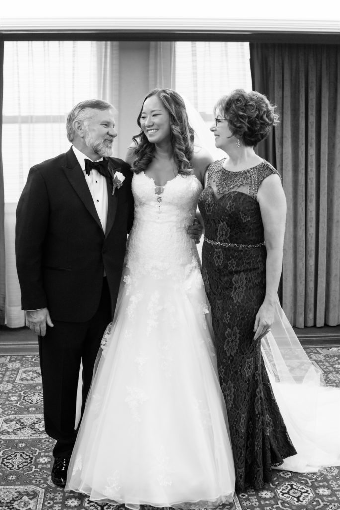 Bride and her parents on the wedding day