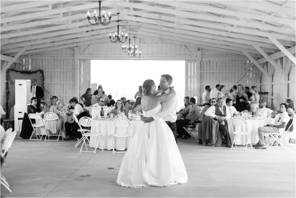 beautiful black and white first dance photo in the barn
