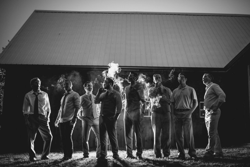 the barn at kennedy farm wedding groomsmen cigars