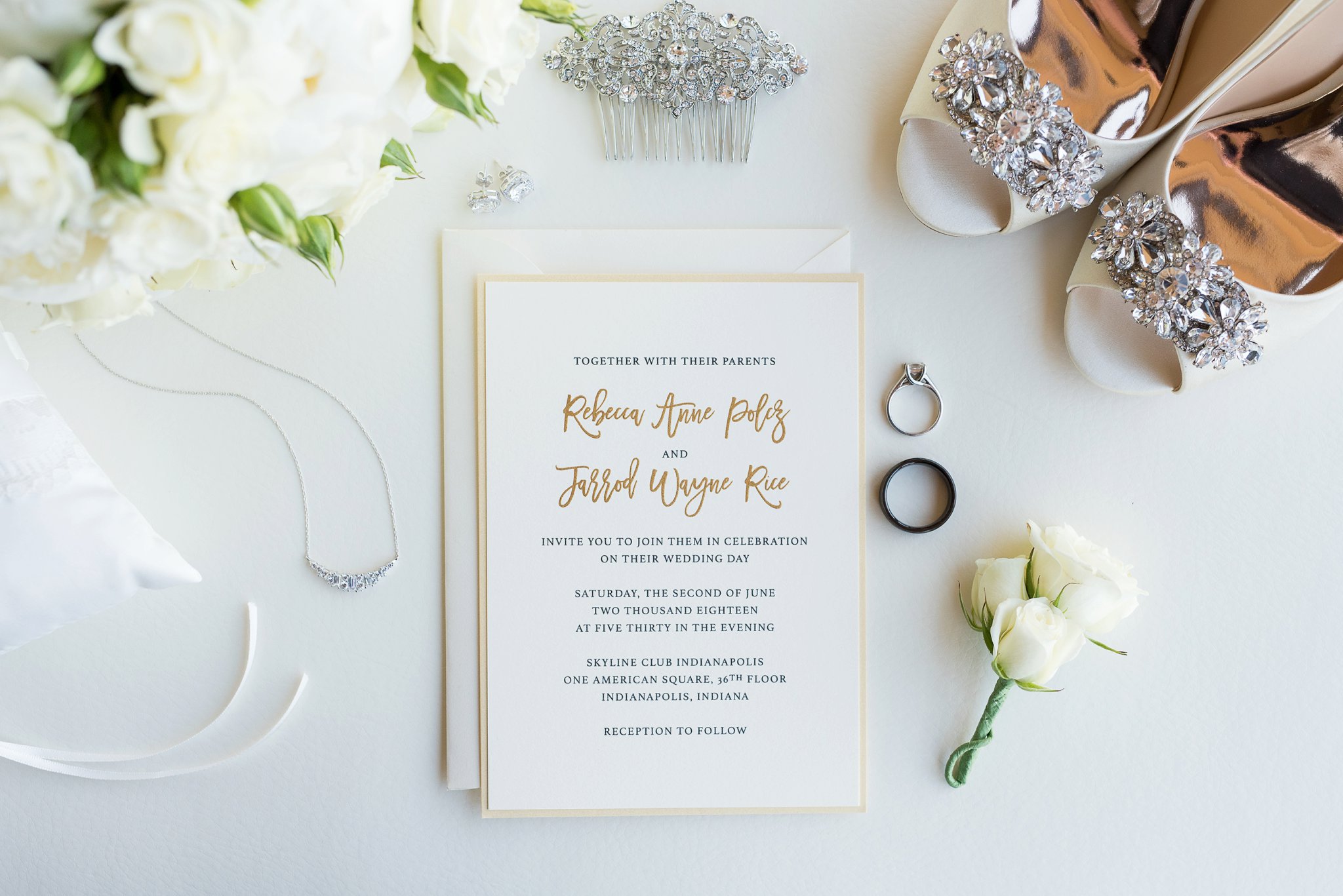Skyline Club Wedding | gold wedding invitation | white roses