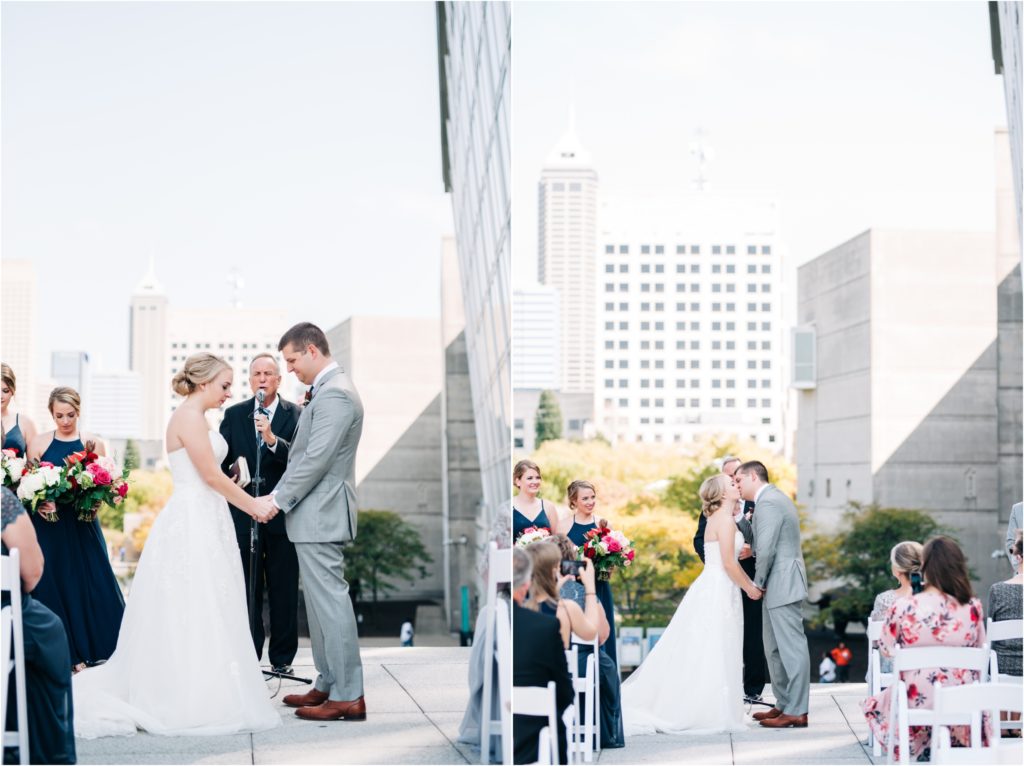 First kiss as husband and wife in downtown Indianapolis with the incredible city skyline