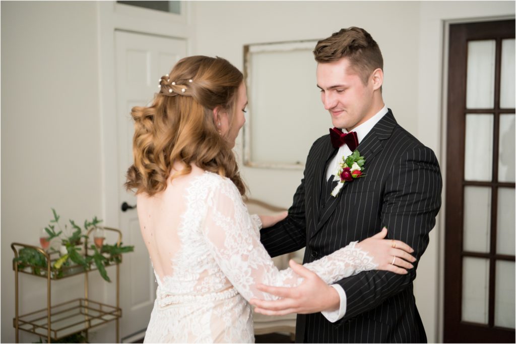 bridal suite indoor first look with groom 