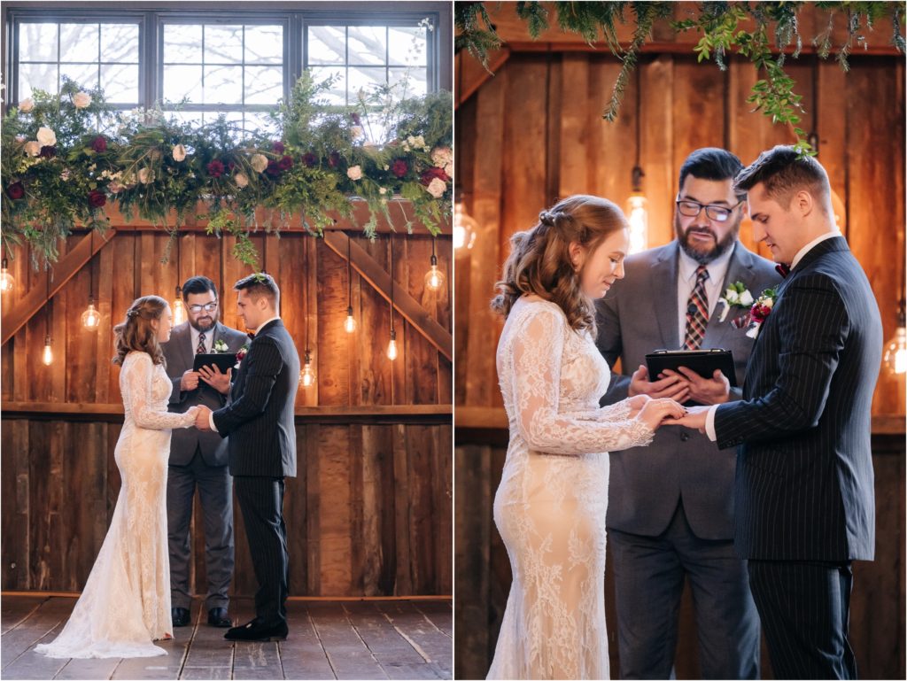 exchanging rings with beautiful barn light and hanging floral installation