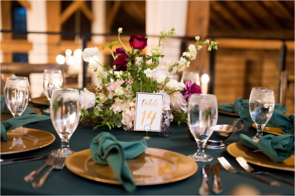Green details for a Christmas wedding in an Indiana barn
