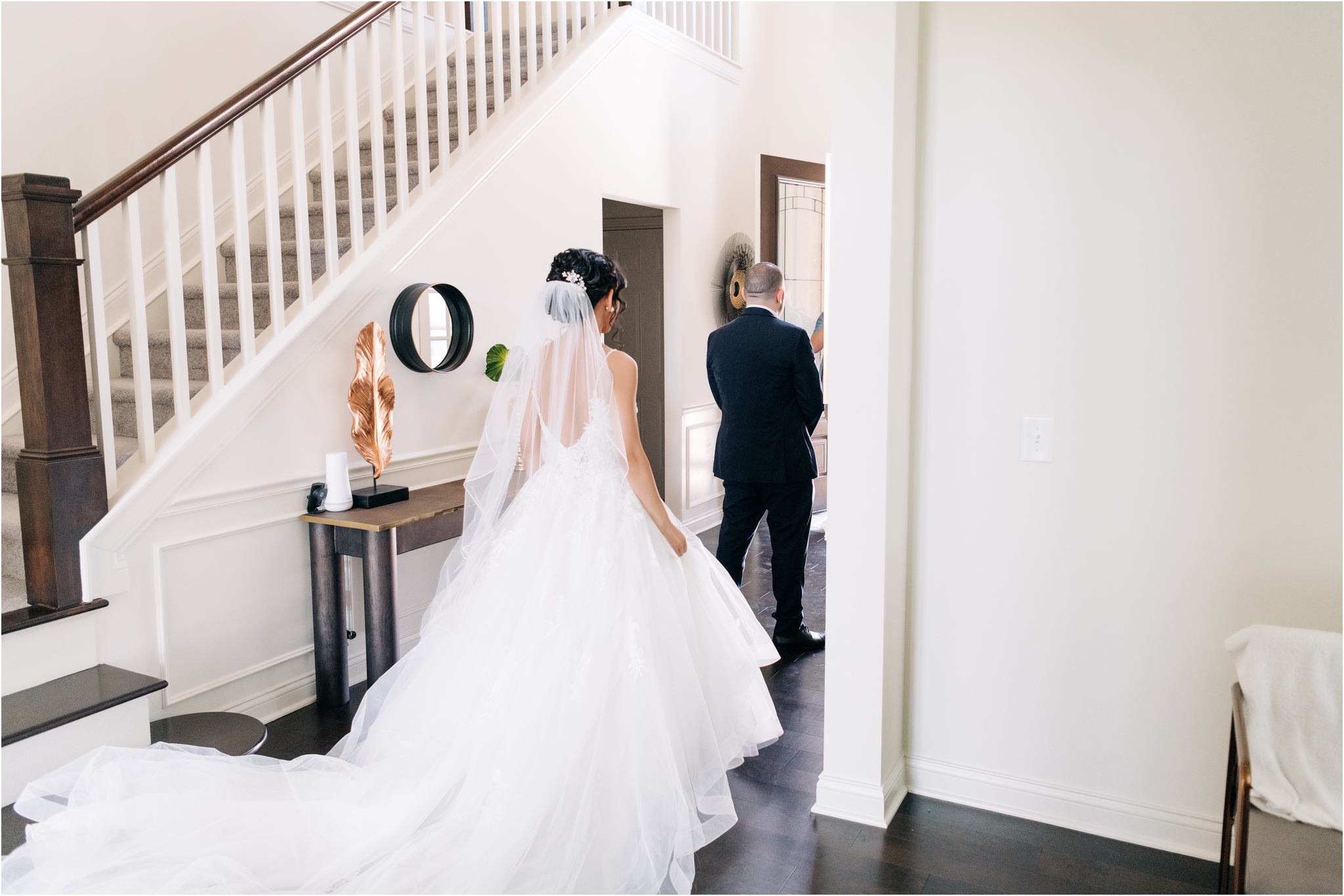 first look with bride and groom in hallway