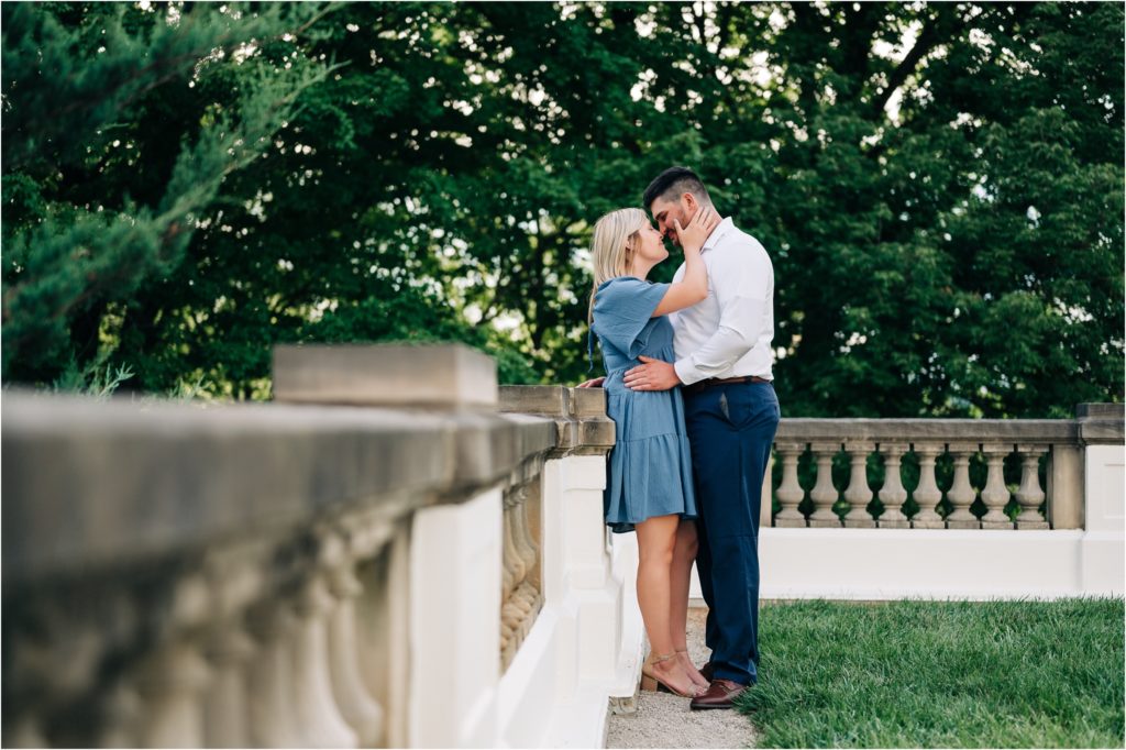 romantic engagement photos on the balcony of the lilly house