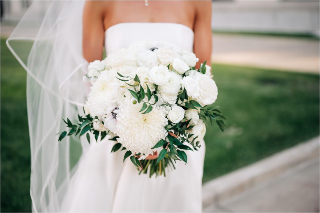 timeless wedding day flowers and long cathedral veil 